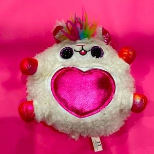 Stuff animal unicorn with heart